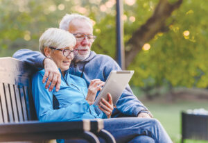 Osprey Point couple with tablet