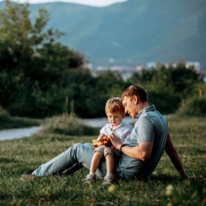 Terrace 592 father son relaxing near the water